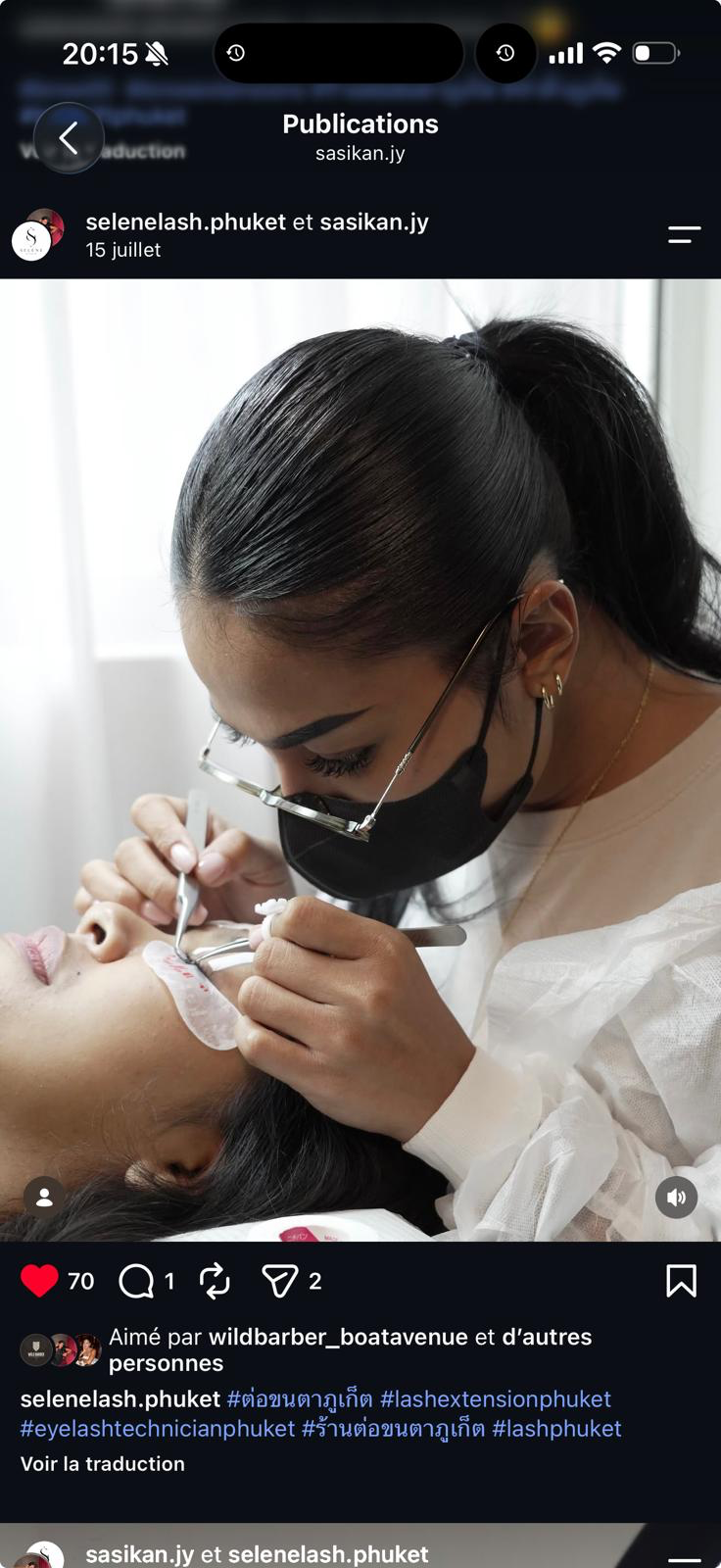 Selene applying eyelash extensions to a client
